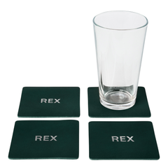 Set of four square emerald leather coasters with a stamped monogram, handmade in Minneapolis