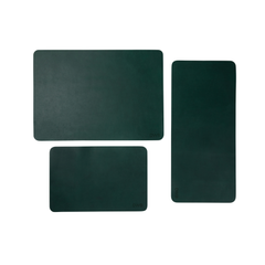 Emerald full-grain leather desk pad on a home office desk, personalized with a monogram