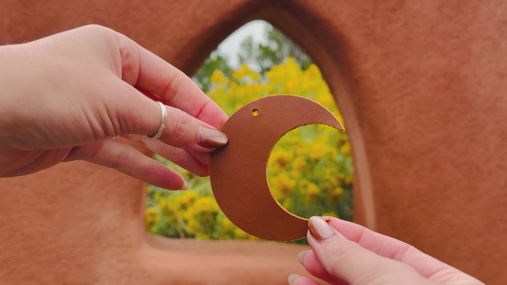 Video of the leather crescent moon bag charm