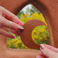 Video of the leather crescent moon bag charm