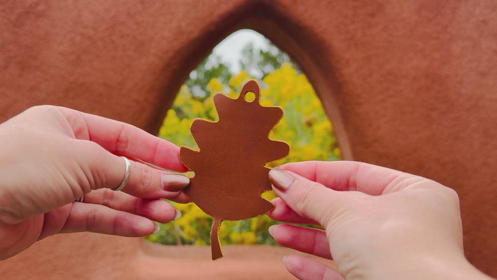 Video of the leather oak leaf bag charm