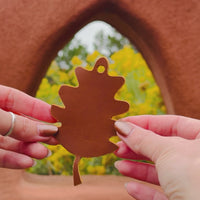 Video of the leather oak leaf bag charm