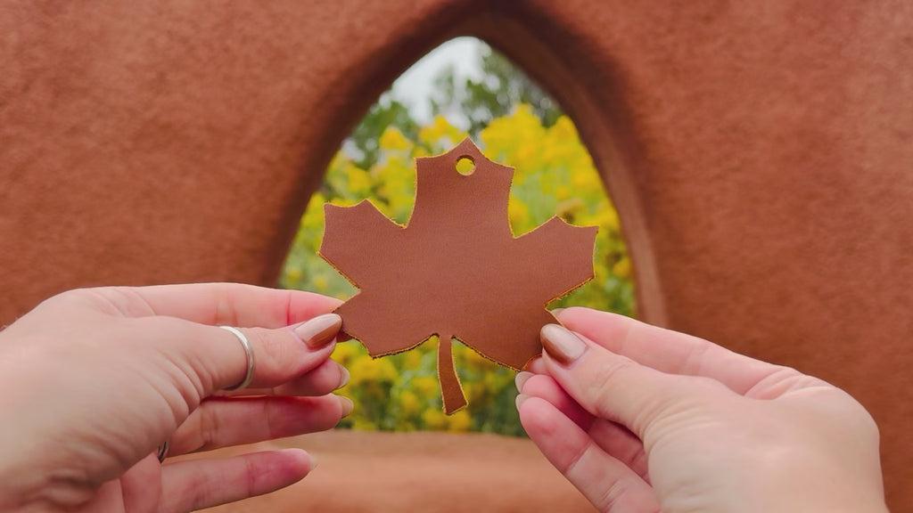 Video of the leather maple leaf bag charm