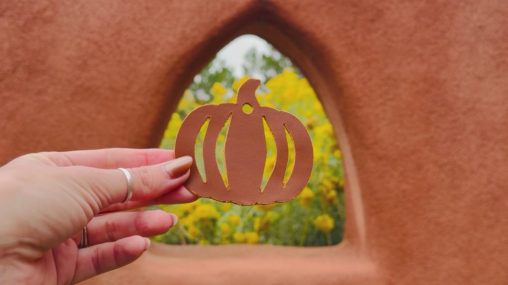 Video of the leather pumpkin bag charm